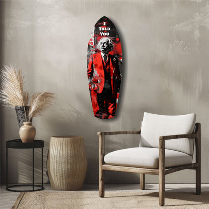 Red and black glass wall art featuring Einstein with "I Told You" text, displayed above mid-century modern furniture in minimalist interior.