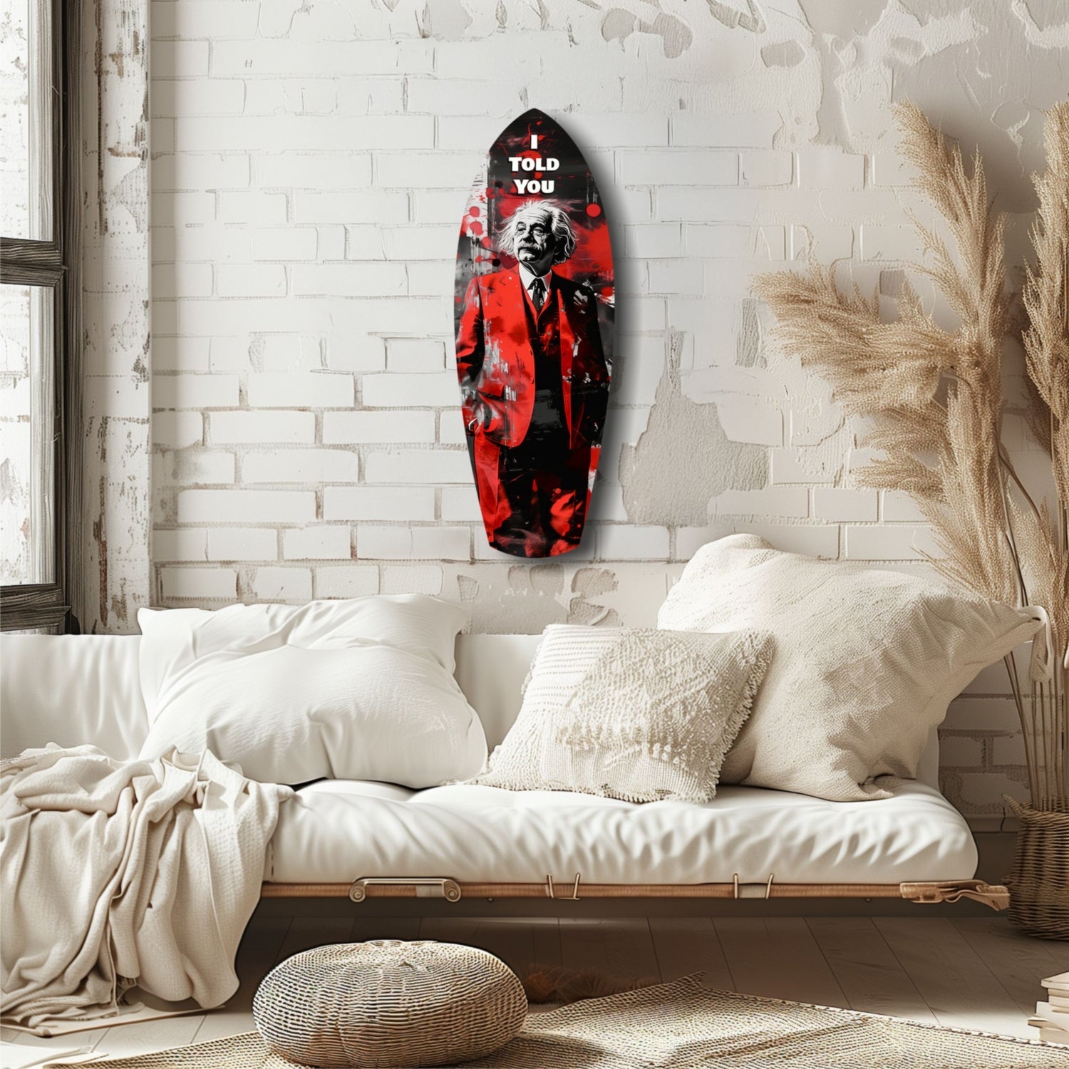 Red and black glass wall art featuring a figure with "I TOLD YOU" text, displayed above a cream bedside bench in a white brick bedroom.