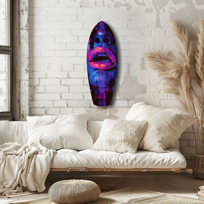 Vibrant neon pink and blue lips glass art hanging on white brick wall above cream bedding.
