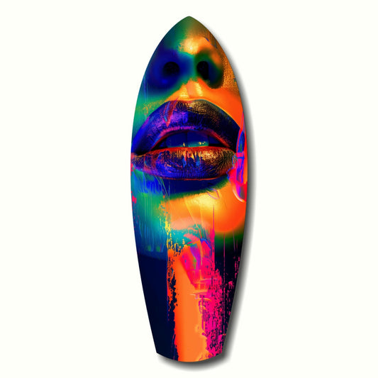 Vibrant surfboard-shaped glass art displaying a stylized face with rainbow colors, prominent lips, and dripping paint effects against white background.