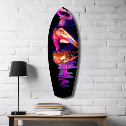 Colorful Lips V7 glass wall art in vibrant neon pink, purple, and orange tones displayed on white brick wall above wooden desk with lamp and books.