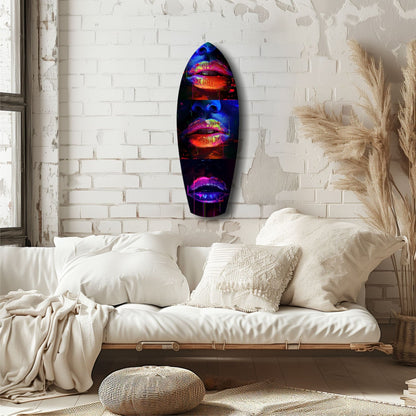 Neon lips glass wall art displayed above a cream linen sofa in a minimalist bedroom with white brick walls.
