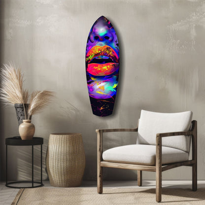 Neon lips glass wall art in vibrant purple, pink, and cyan displayed above a wooden chair in a modern interior.
