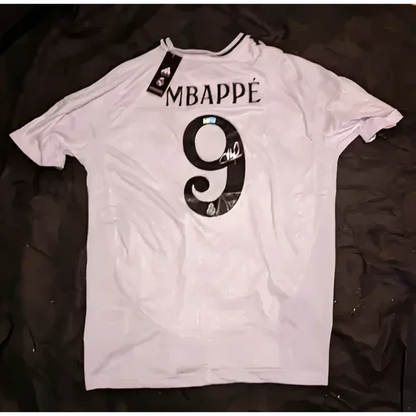 White Kylian Mbappe Real Madrid signed jersey with MBAPPE and number 9 on back