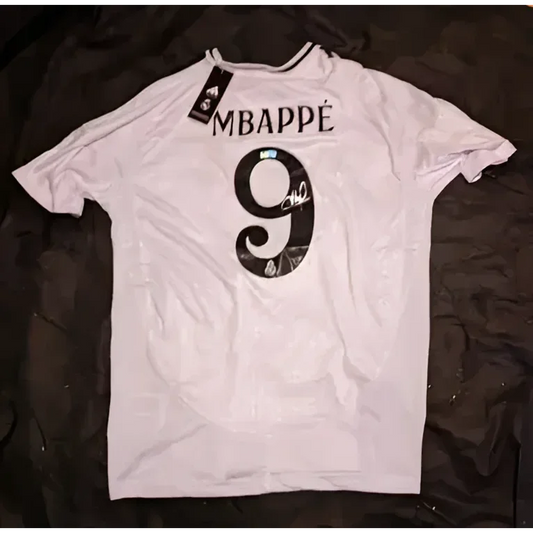 White Kylian Mbappe Real Madrid signed jersey with MBAPPE and number 9 on back