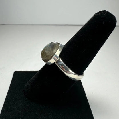 Elegant labradorite ring with oval silver stone in polished band