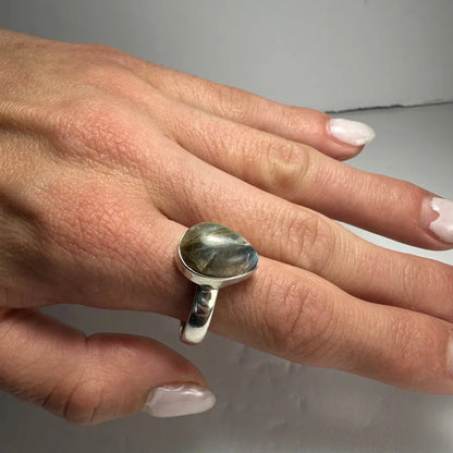 Silver labradorite ring with teardrop stone in iridescent green, blue, gray hues