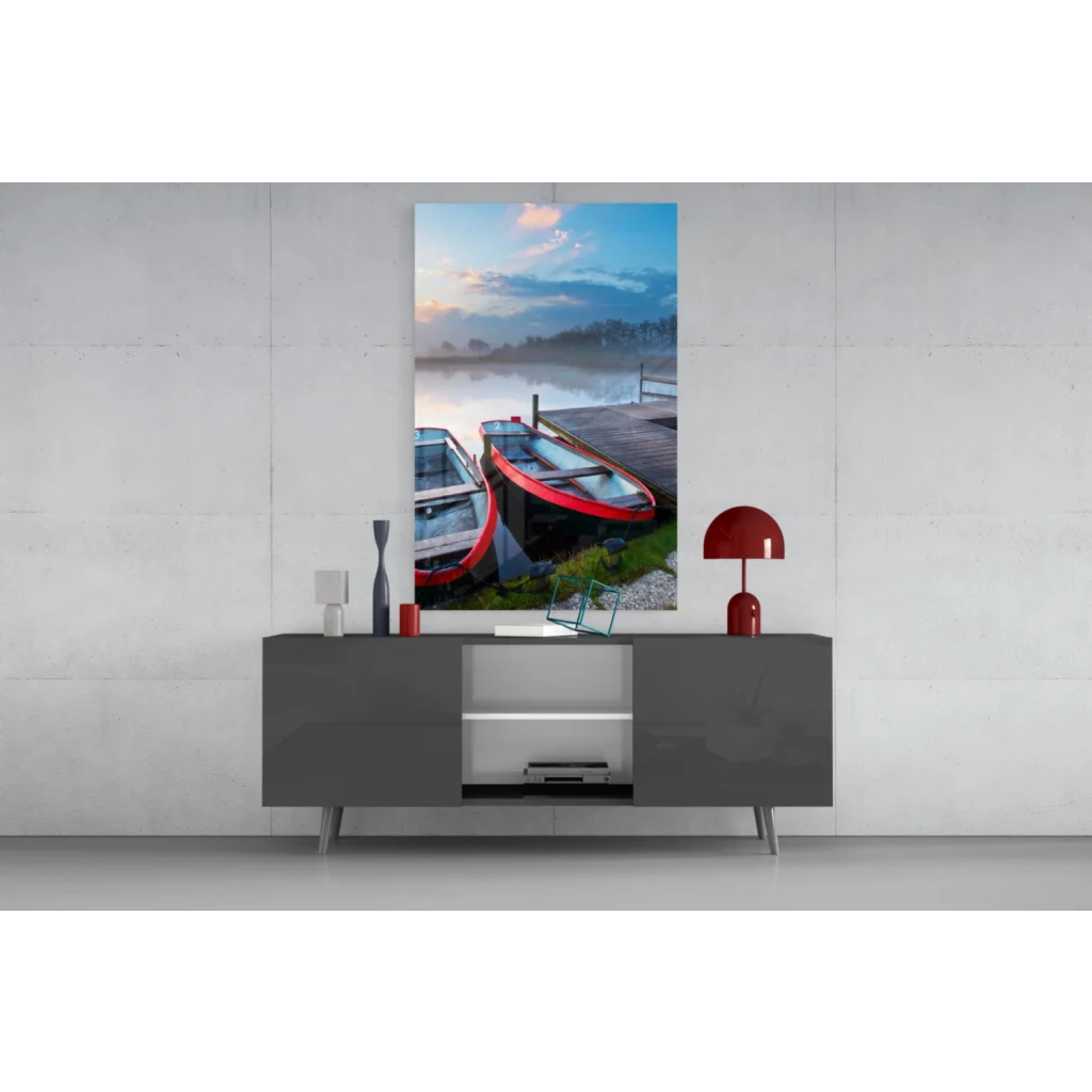 Vibrant red canoe in misty lakeside glass wall art canvas print