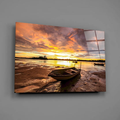 Tranquil Sunset Boat Glass Wall Art with Glowing Sky Reflections | Glass Wall Art Print | vintageantiquesgifts.com