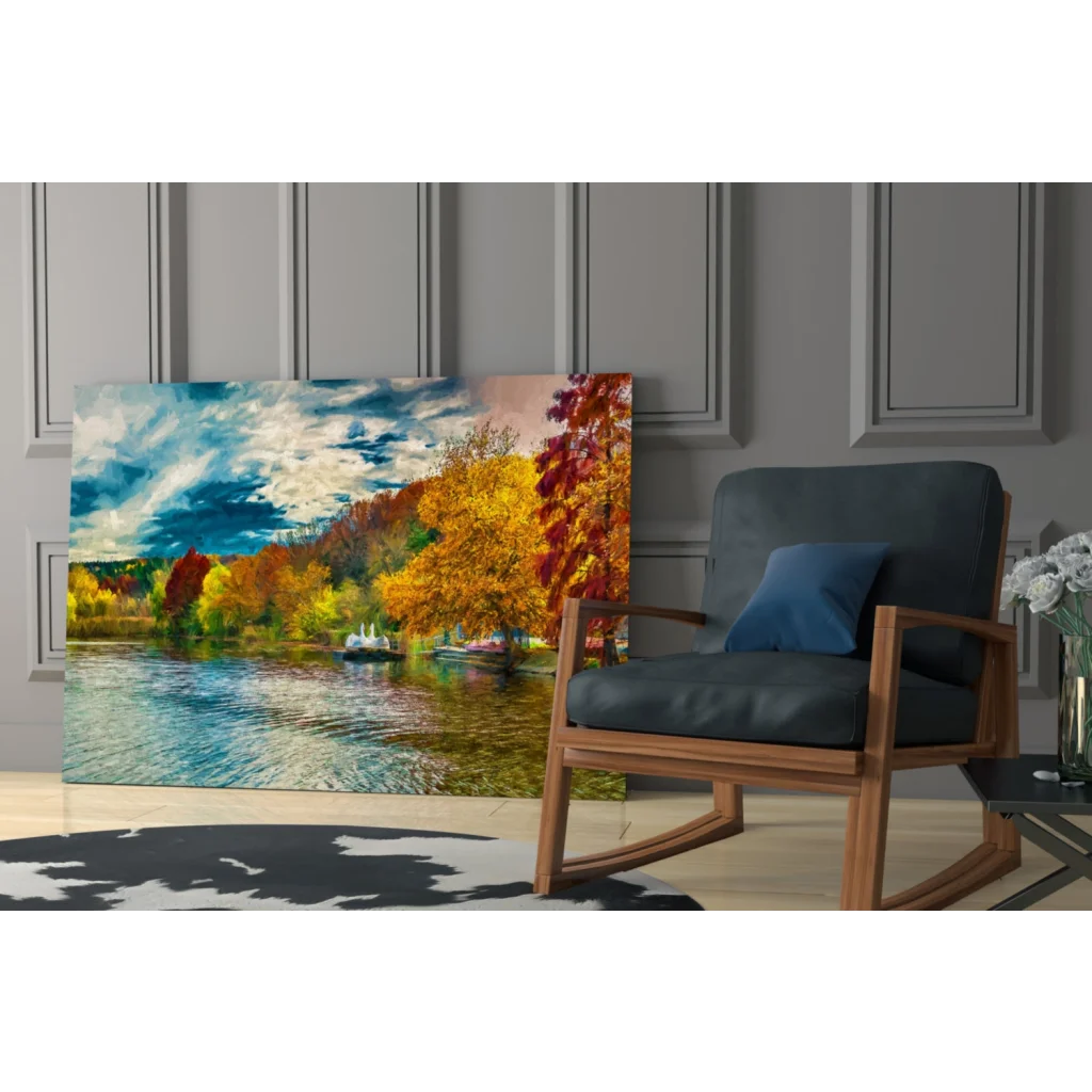 Vibrant autumn glass wall art of fiery trees reflected in calm blue lake