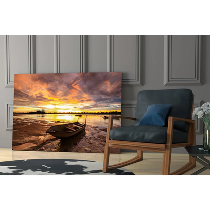 Tranquil sunset boat on reflective water in glass wall art