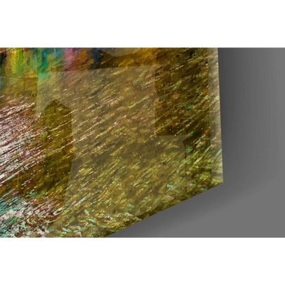Abstract golden-yellow glass wall art with iridescent green-blue overlays