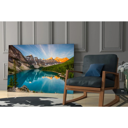 Stunning turquoise mountain lake glass wall art leaning on gray wall