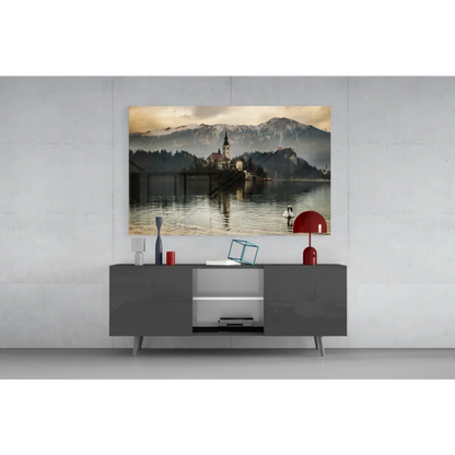 Serene alpine lake glass wall art with swan, mountains, and chapel