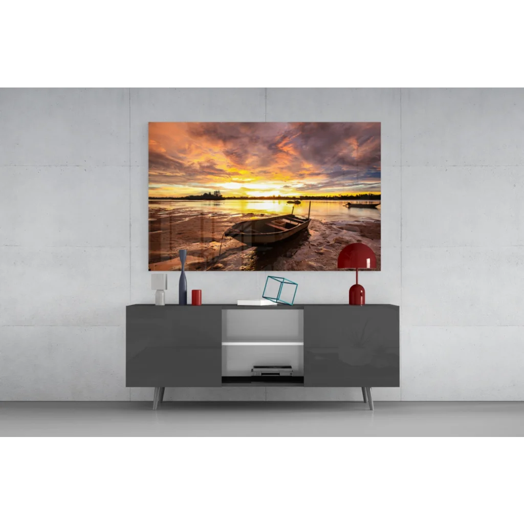 Tranquil sunset boat glass wall art with glowing sky reflections