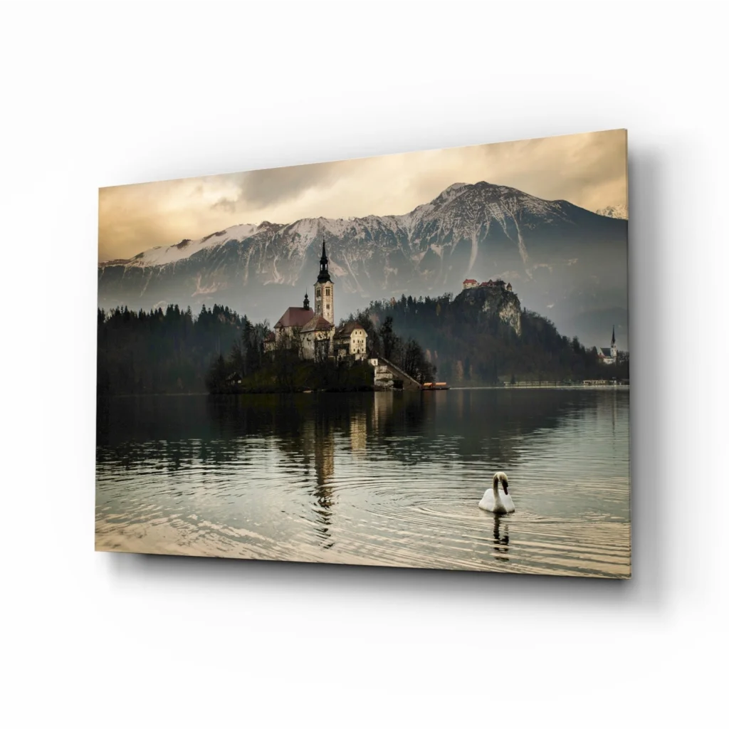 Serene alpine lake glass wall art with swan, mountains, chapel