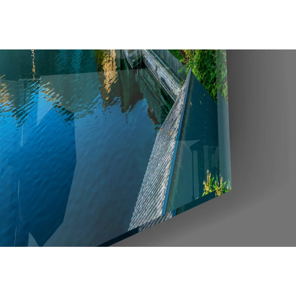 Sleek glass wall art of Blue Mountain Lake Village with waterway reflections