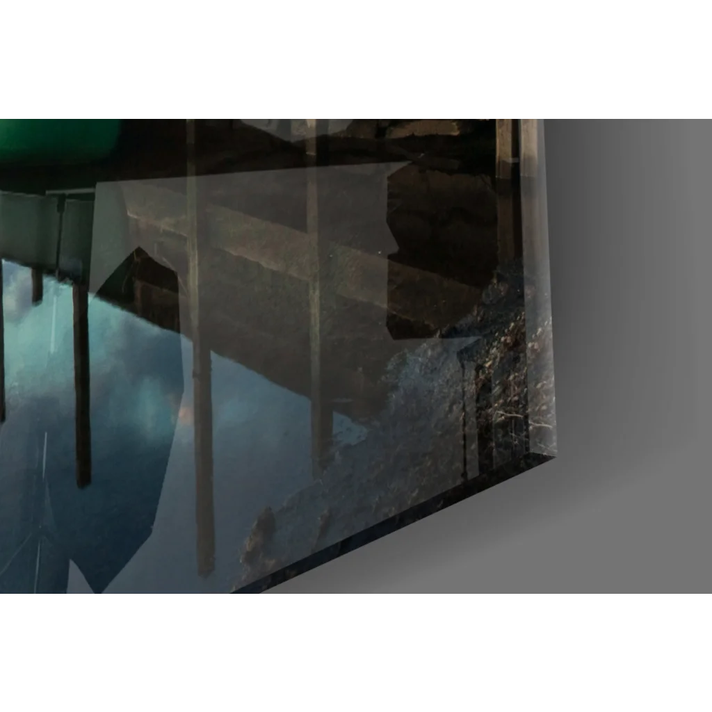 Cracked glossy glass wall art of Sunset Lake with canoe and mountains