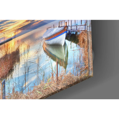 Stunning sunset boat glass wall art with white vessel and blue stripe