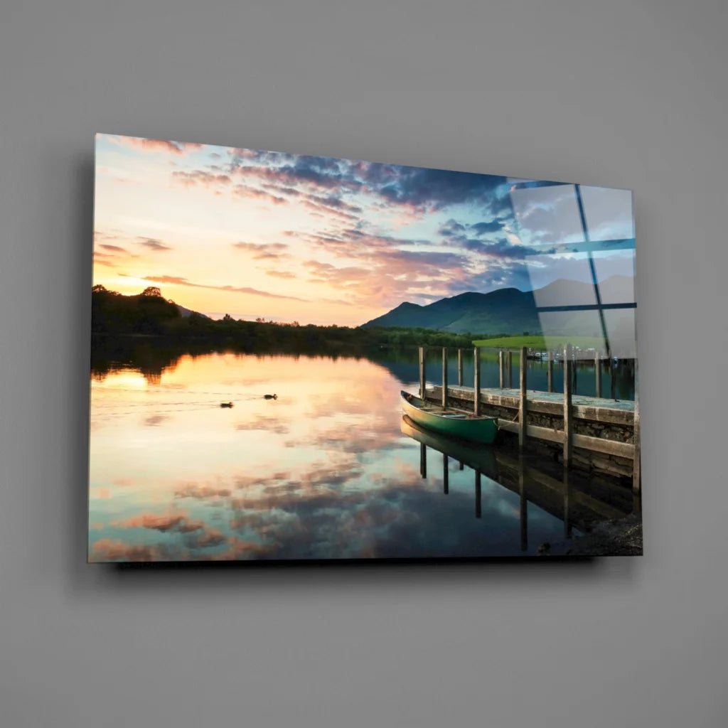 Sleek sunset lake glass wall art with canoe, mountains, dock