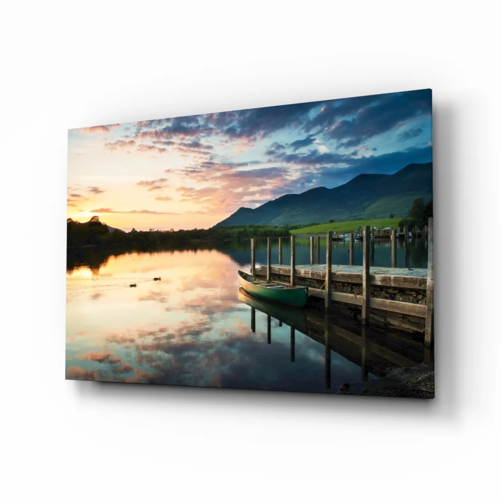 Serene sunset lake glass wall art with canoe on dock and mountains