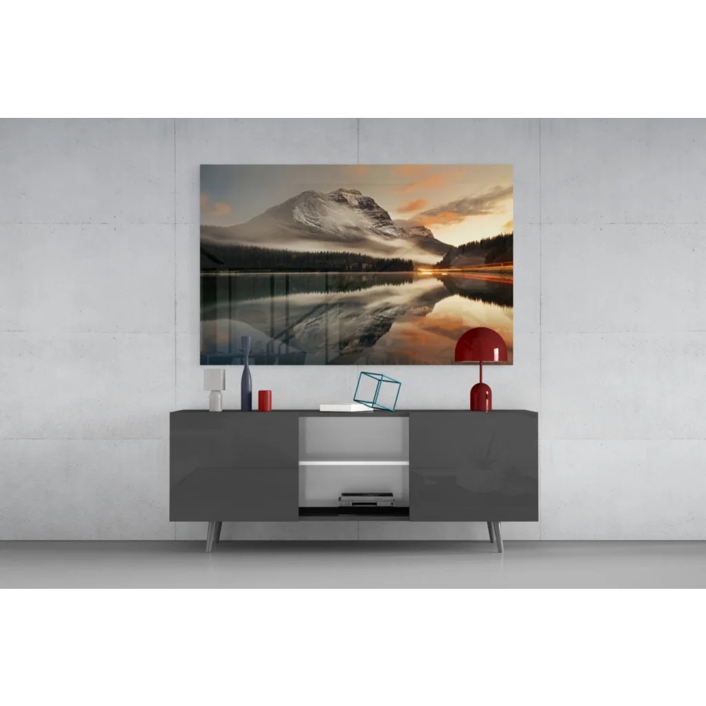 Modern gray console table with red lamp and Sunset Mountain Lake glass wall art
