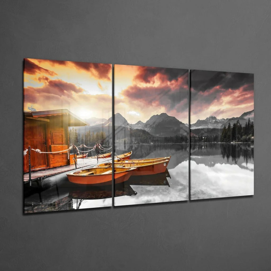 Stunning sunset boats triptych wall art with orange glow on serene lakeside