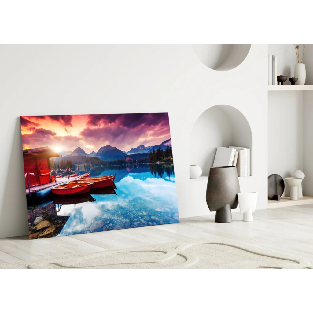 Vibrant sunset lake glass wall art with red boats and mountains