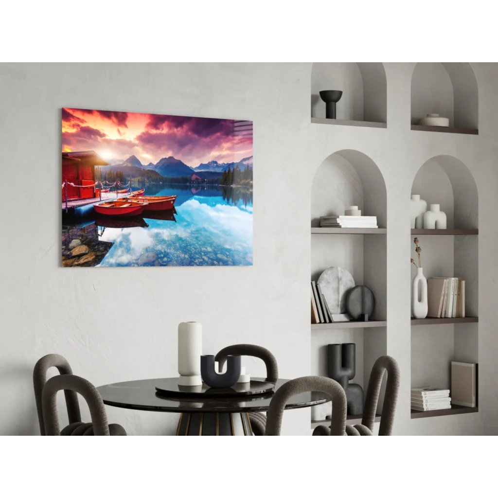 Vibrant sunset lake glass wall art with red boats and mountain peaks