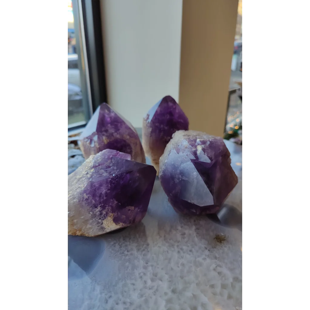 Large Bolivian amethyst point from Anahi Mine with deep purple translucent facets