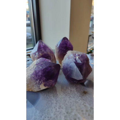 Large Bolivian amethyst point from Anahi Mine with deep purple translucent facets