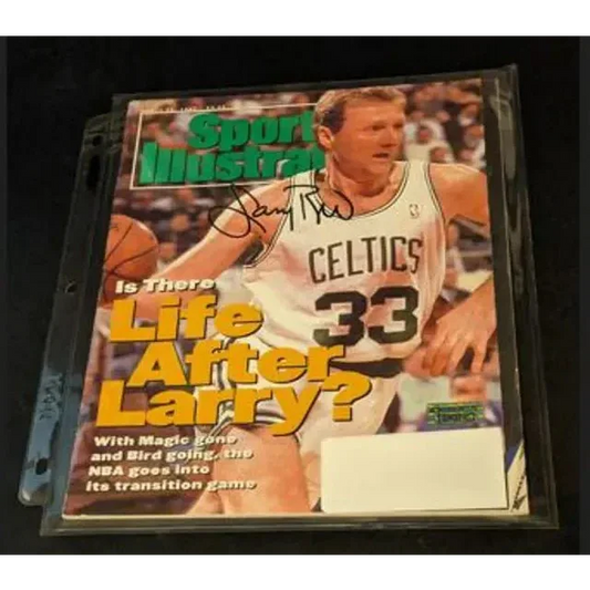 Autographed Sports Illustrated magazine featuring Larry Bird with COA for bird autographed sports fans