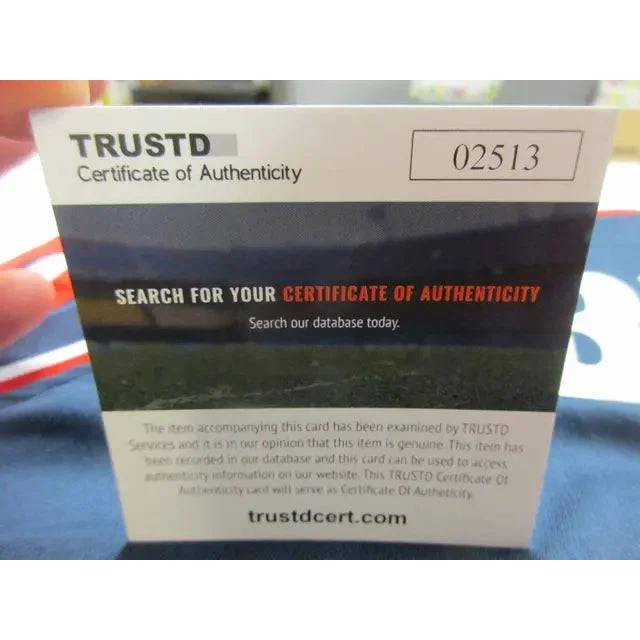 White certificate of authenticity card with serial number for Larry Bird Team USA signed jersey