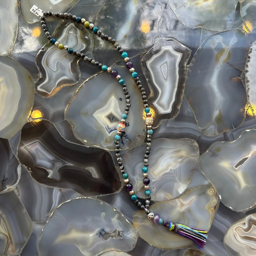 Larvikite, amethyst, and blue apatite mala beads with colorful tassel