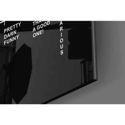 Black softbox light against plain backdrop in Hahahaha wall art print