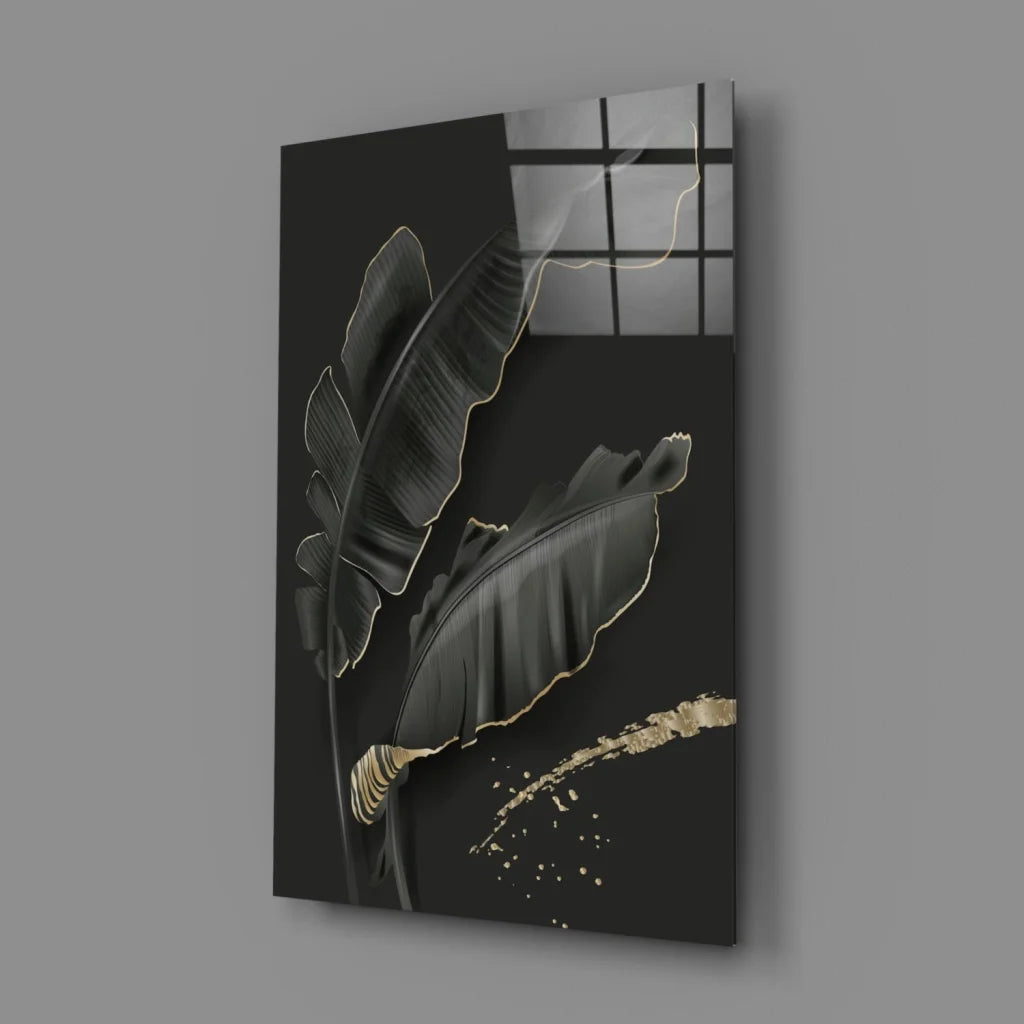 Luxe black gold banana leaf glass wall art with glossy finish