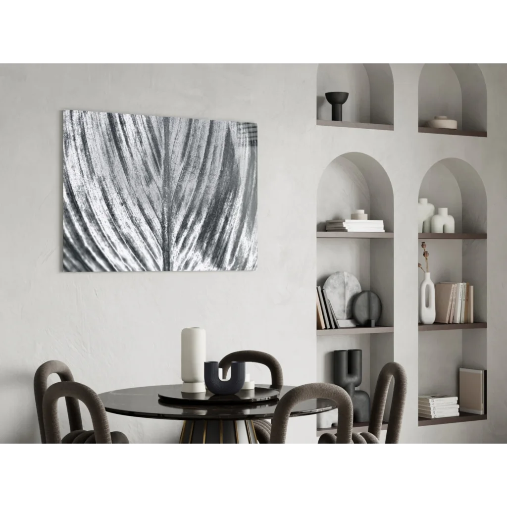 Bold abstract leaf glass wall art in black and white with silver metallic finish