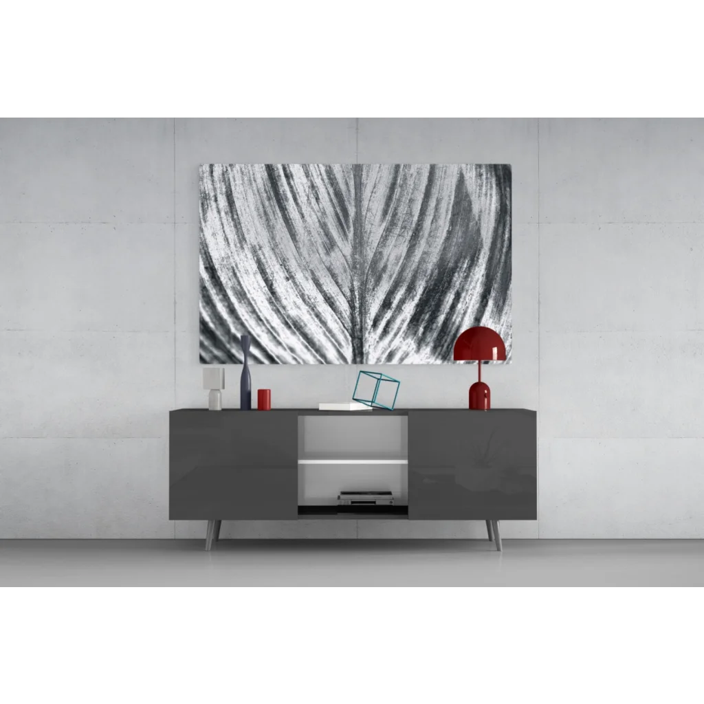 Bold black and white abstract leaf glass wall art with textured brushstrokes