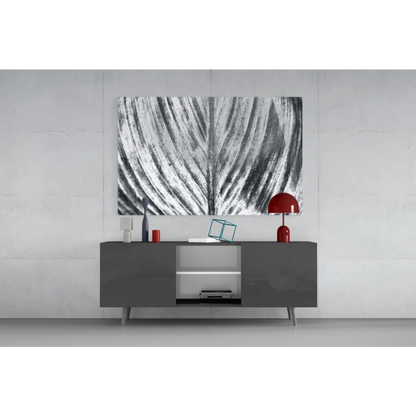 Bold black and white abstract leaf glass wall art with textured brushstrokes