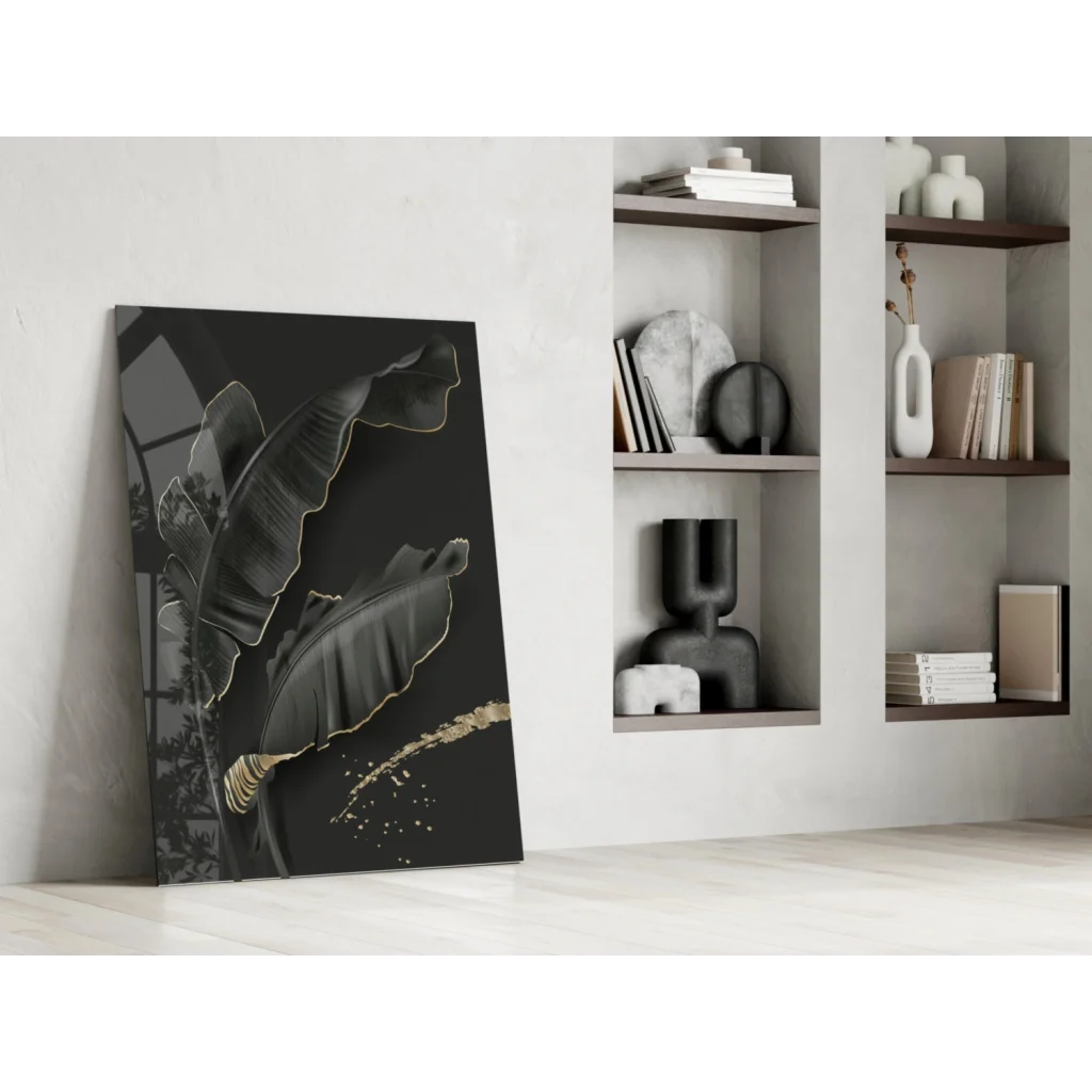 Luxe black gold banana leaf glass wall art with glossy finish