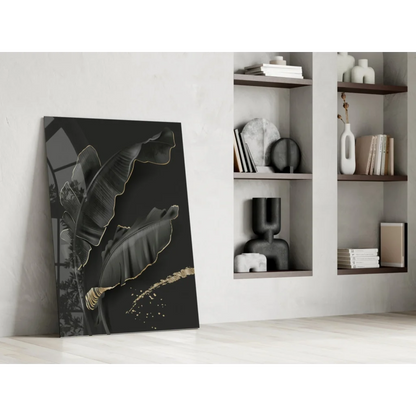 Luxe black gold banana leaf glass wall art with glossy finish