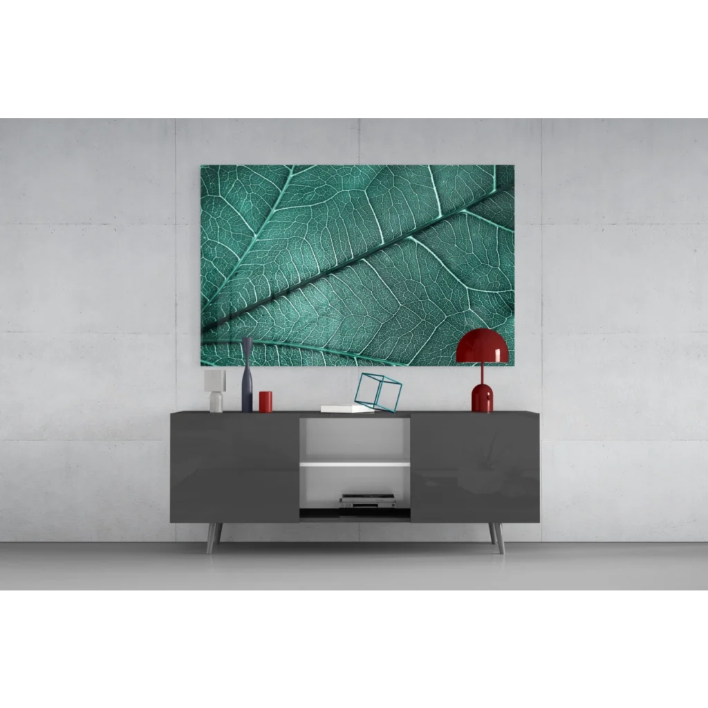 Vibrant teal glass wall art with emerald leaf and intricate vein details