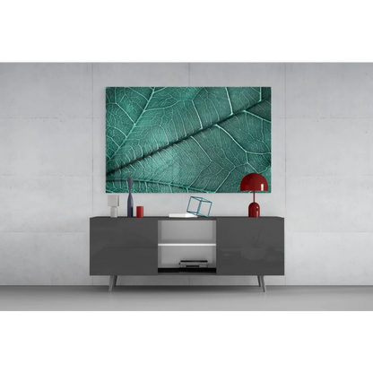 Vibrant teal glass wall art with emerald leaf and intricate vein details