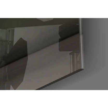 Sleek dark gray metallic glass wall art mirror in Leaping Ballerina design