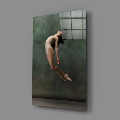 Ballerina leaping in beige leotard on misty green canvas wall art