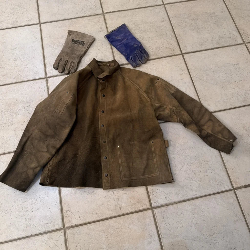 Brown leather welding jacket coat with reinforced patches and buttons