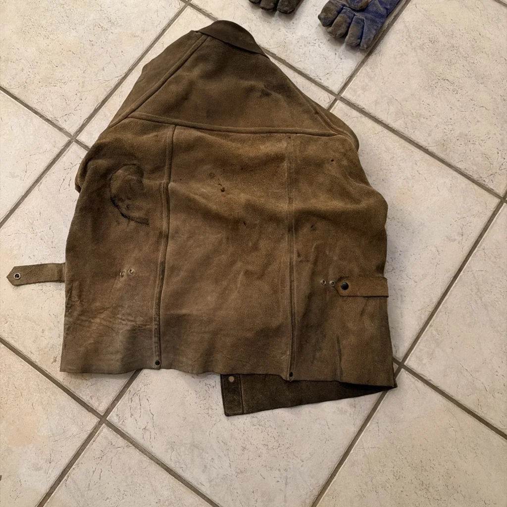Worn brown suede leather welding jacket coat with stitching and patches