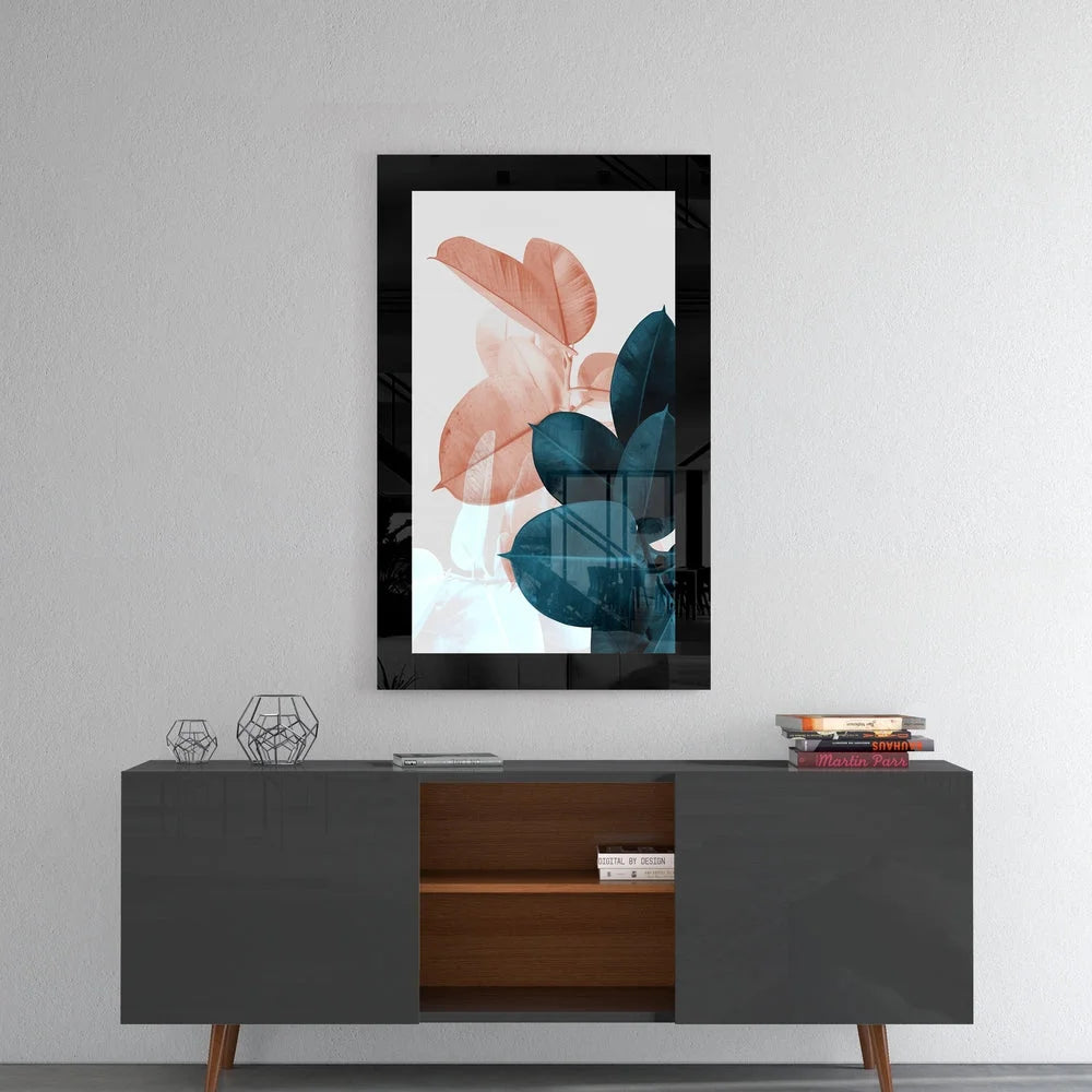 Modern botanical glass wall art with peach teal leaves in black frame