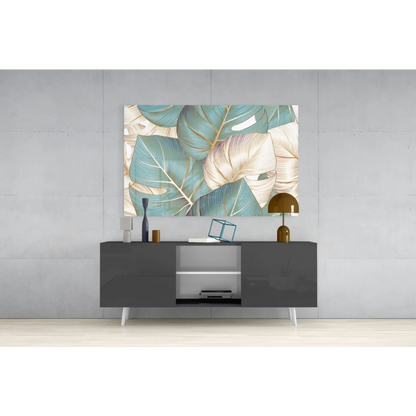 Tropical teal gold leaf canvas wall art with stylized leaves in teal, cream, gold