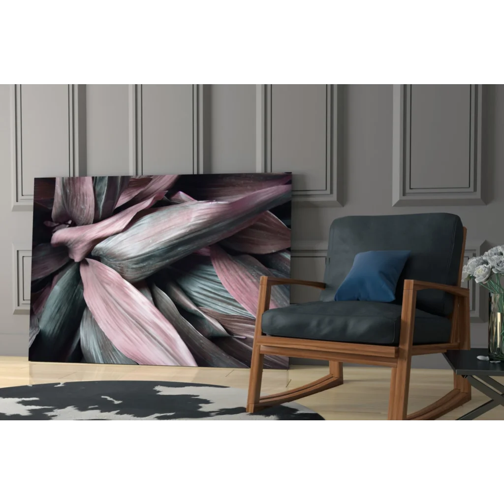 Layered leaves glass wall art in pink and teal abstract close-up